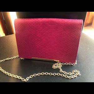 Pink snake skin purse